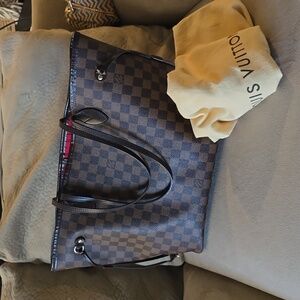 Louis Vuitton damian neverfull bag in perfect condition.